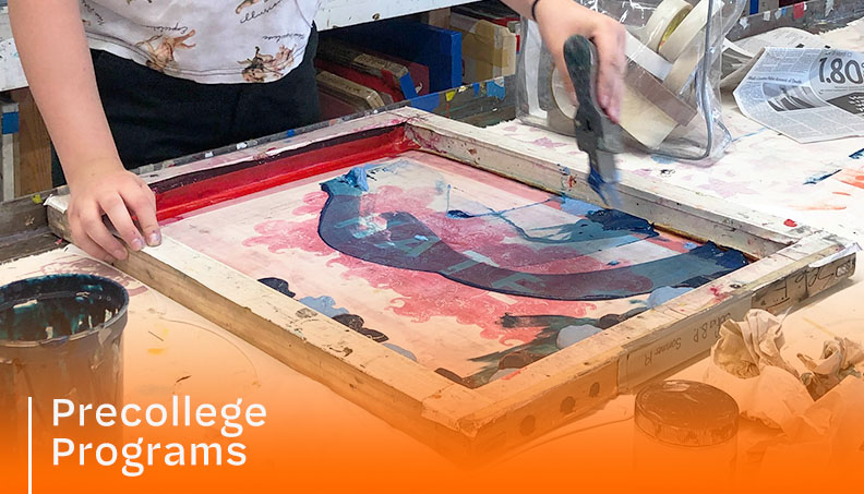 high school student spreading ink on a screen